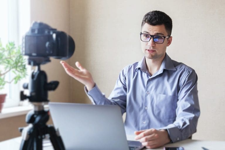 Young man conducting a webinar
