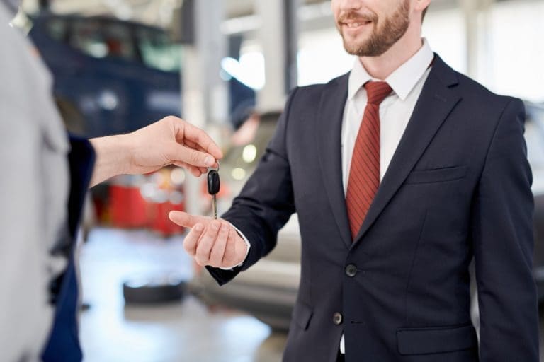 Businessman Holding Car Keys