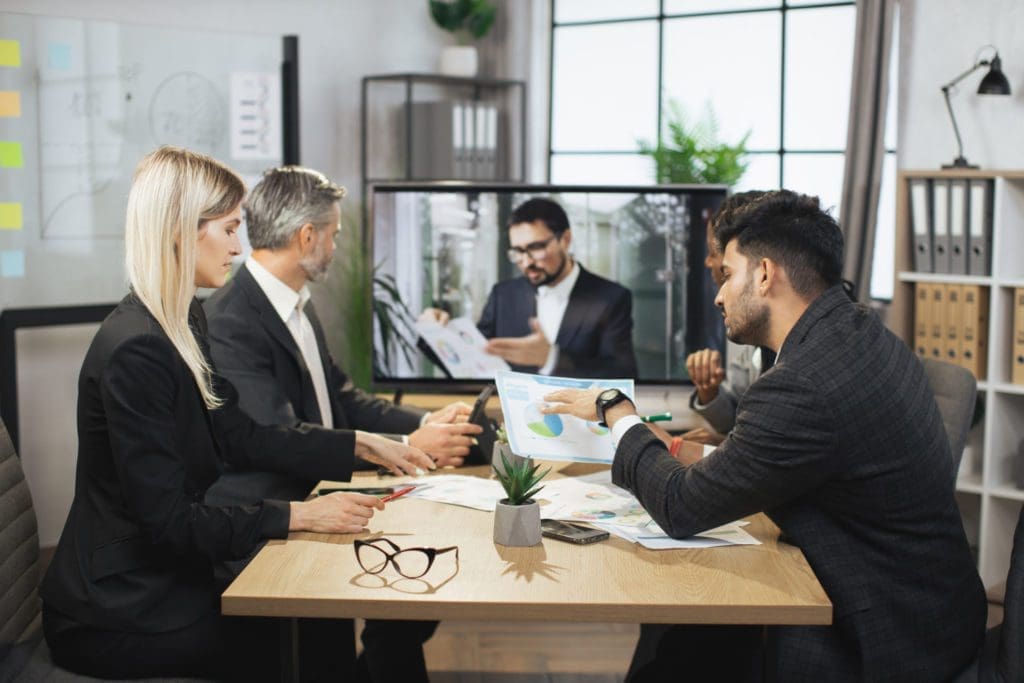 Professionals meeting for practice management consulting